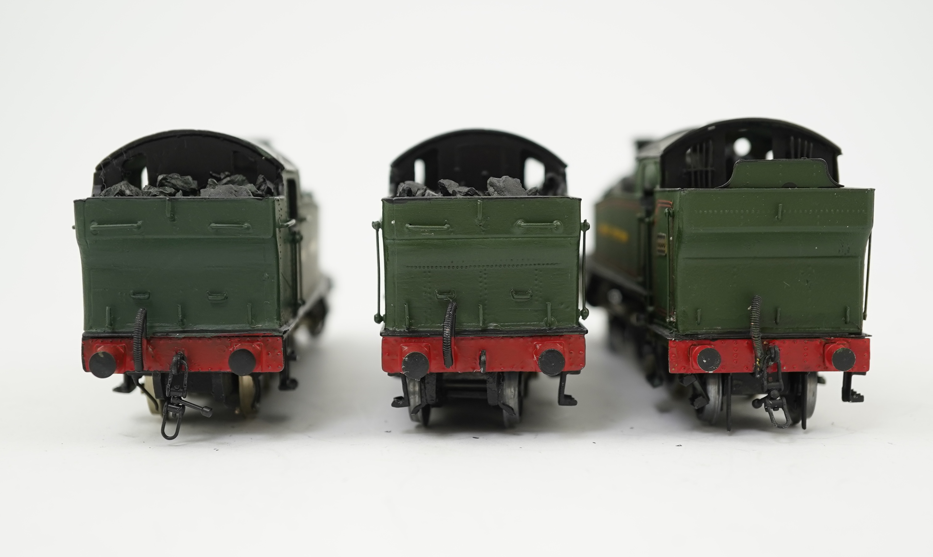 Three 00 gauge kit built GWR tank locomotives, two brass and white metal; a 42xx class 2-8-0T, 4200, together with an 72xx class 2-8-2T, 7200, plus a plastic/resin and metal 22xx class 4-4-2T, 2222, all constructed, pain